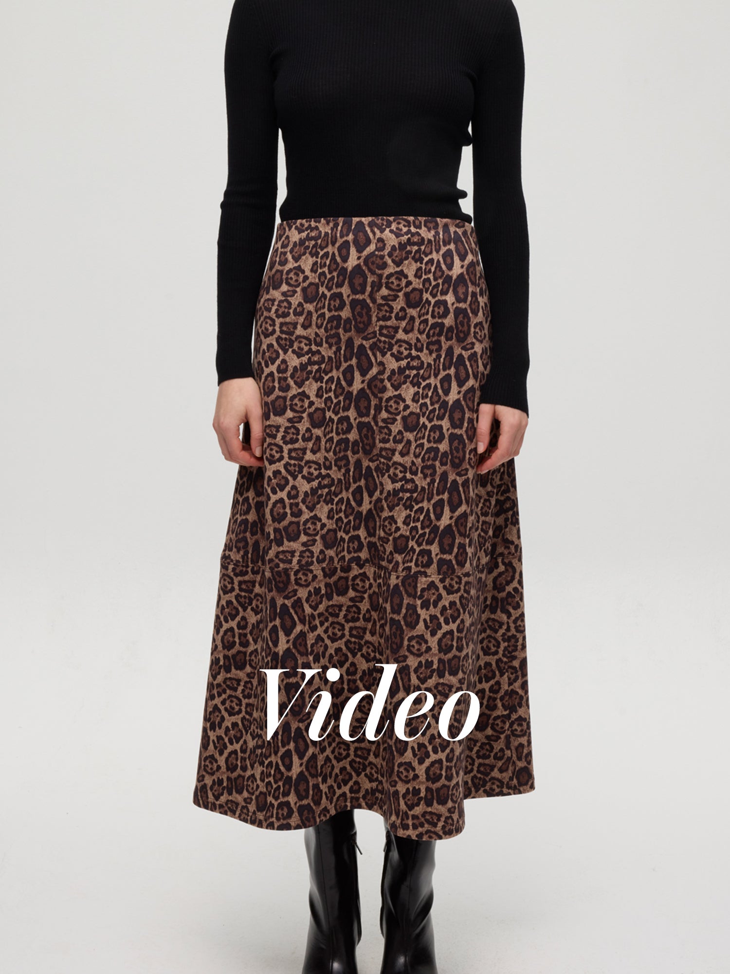 mioh | HEARST ANIMAL - Falda midi animal print. Vestidos de fiesta para invitadas de boda perfectas. Marca española de moda