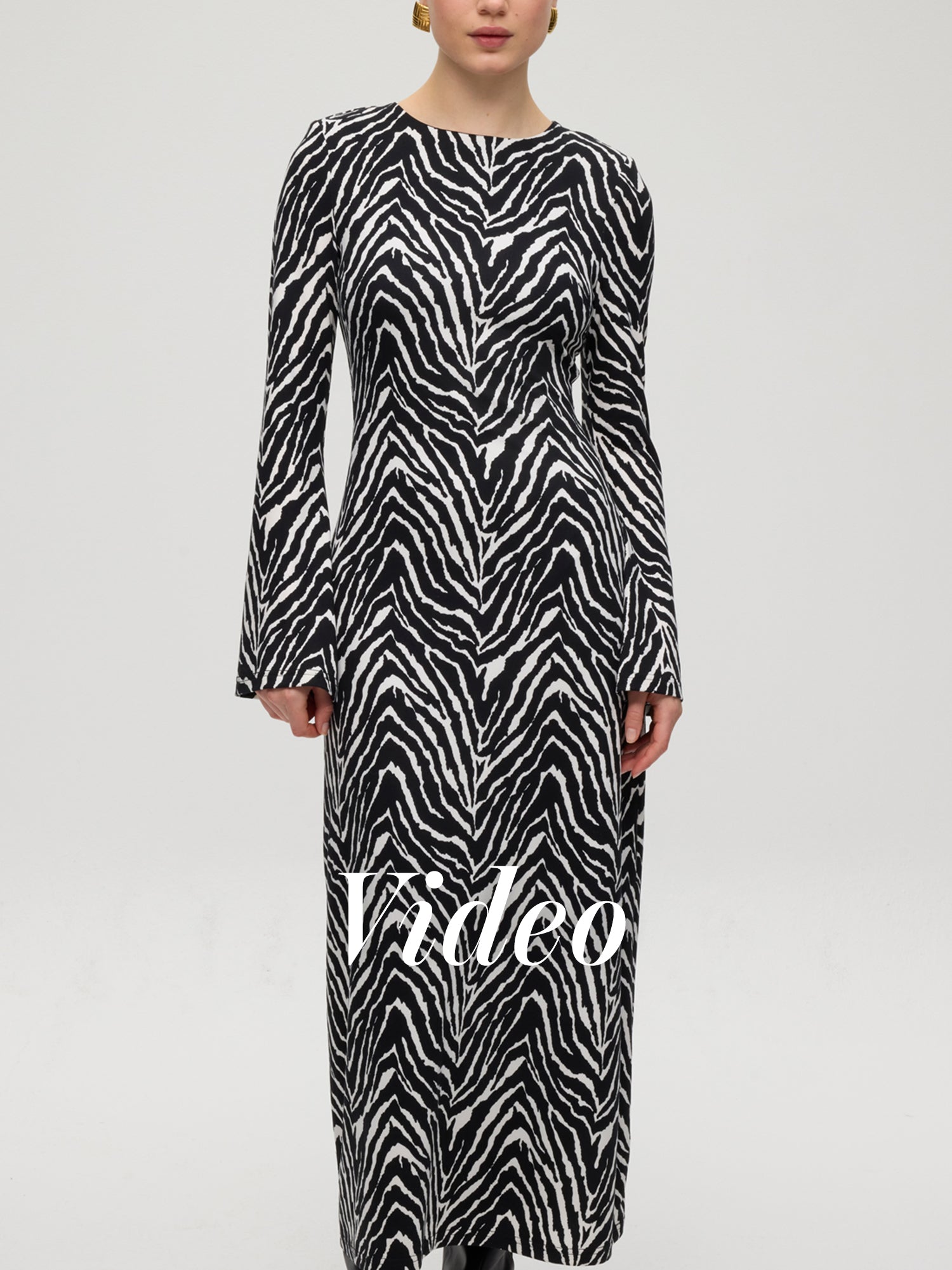 mioh | MET ANIMAL - Vestido midi punto cuello redondo cebra. Vestidos de fiesta para invitadas de boda perfectas. Marca española de moda